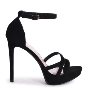 Side view of black platform heels by Lajwanti Shoes with crisscross strap and high heel.