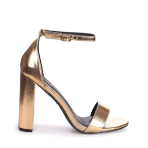 Gold high heels with ankle strap and block heel design for women.