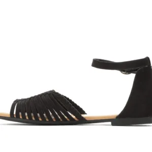 Private label flat shoes with ankle strap and braided design in black.