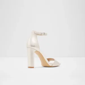 High heels ivory by Lajwanti Shoes with ankle strap and block heel for elegant comfort.