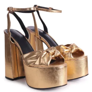 gold platform shoes with ankle strap by Lajwanti Designers