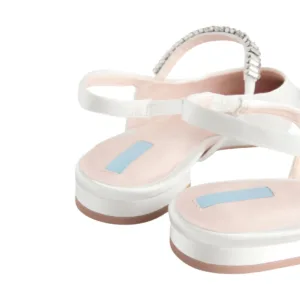 white flat wedding shoes from Lajwanti Designers with silver strap