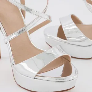 silver girls platform shoes with criss-cross straps and high heels by Lajwanti Designers