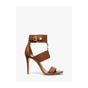Brown leather high-heeled sandals with ankle buckle and high heels by Lajwanti Designers.