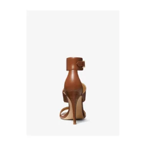 Back view of brown leather high-heeled sandals with ankle buckle by Lajwanti Shoes.