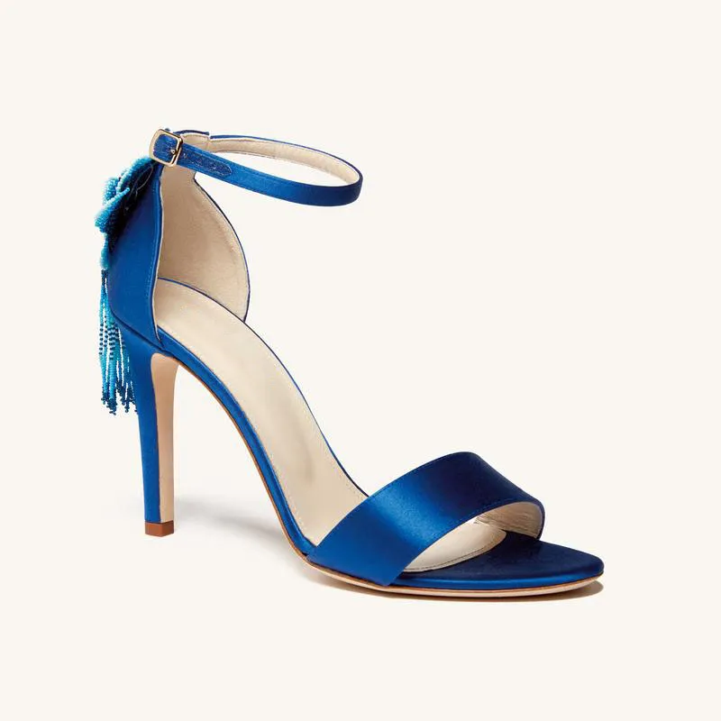 Elegant blue sandals with ankle strap and tassel detail Blue sandals with ankle strap and tassel detail
