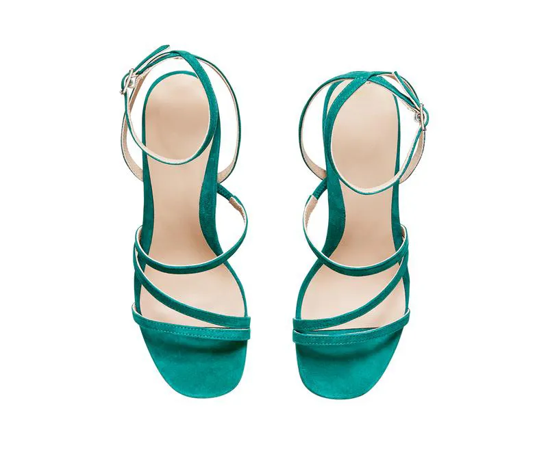 Top View of Teal Suede Private Label Sandals with Crisscross Straps by Lajwanti Pakistan Top view of teal suede private label sandals with crisscross straps by Lajwanti Pakistan.