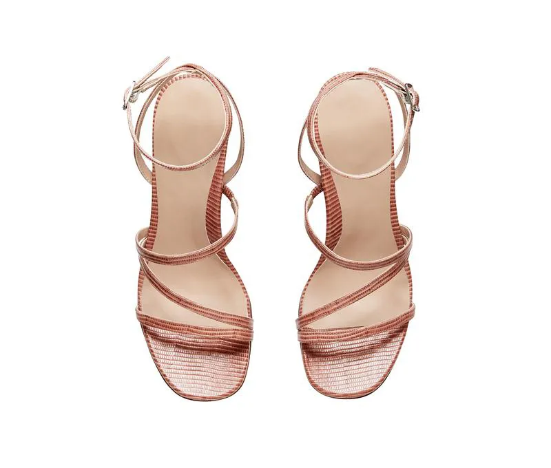 Top View of Pink Strappy Sandals with Ankle Strap and High Heels by Lajwanti Collections Top view of pink strappy sandals with ankle strap and high heels by Lajwanti Collections.