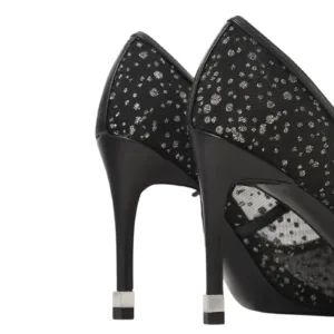 Back view of elegant black wedding shoes for bride by Lajwanti Shoes, showcasing the perfect heel design.