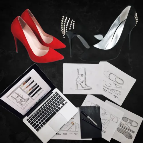 Custom-made red and black high heels with sketches and designs showcasing bespoke footwear craftsmanship.